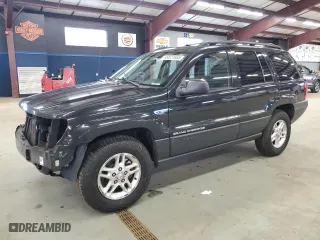 2003 Jeep Grand Cherokee Laredo with VIN 1J4GW48S23C613471, listed as a Copart auction lot 49521865 with 189,918 mi miles and Salvage Title. Bid and sale history available at carsss.com. Image 1.