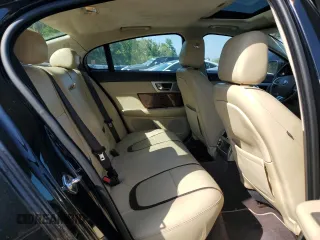 2015 Jaguar XF V6 Portfolio with VIN SAJWJ0FFXF8U60040, listed as a Copart auction lot 52912695 with 112,618 mi miles and Salvage Title. Bid and sale history available at carsss.com. Image 10.