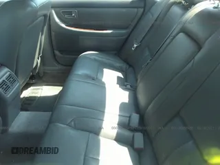 2001 Toyota Avalon XL z VIN 4T1BF28B71U162206, wystawiony jako IAAI lot #41673437 z przebiegiem 363 472 mil mil oraz . Historia ofert i sprzedaży dostępna na DreamBid. Obrazek 8.