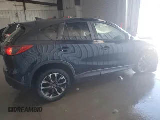 2016 Mazda CX-5 Grand Touring with VIN JM3KE4DY7G0735576, listed as a Copart auction lot 41916395 with 0 mi miles and Non Repairable. Bid and sale history available at carsss.com. Image 3.