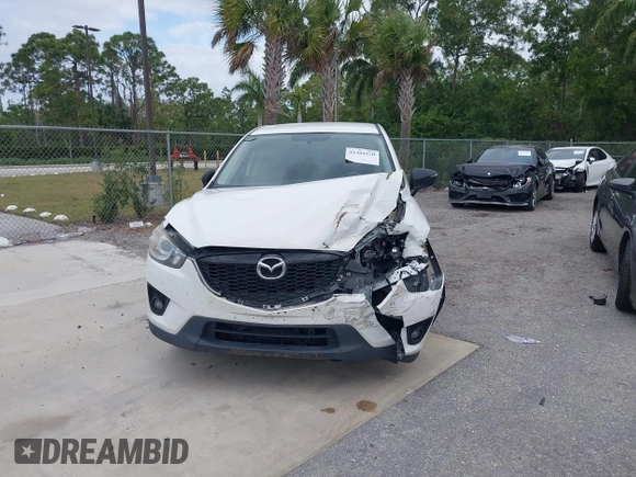 2015 Mazda CX-5 Touring with VIN JM3KE2CY8F0545967, listed as a IAAI auction lot 41909920 with 101,781 mi miles. Bid and sale history available at carsss.com. Image 12.