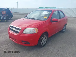 2011 Chevrolet Aveo 1LT with VIN KL1TD5DE1BB144692, listed as a IAAI auction lot 41908565 with 104,691 mi miles and . Bid and sale history available at DreamBid. Image 2.