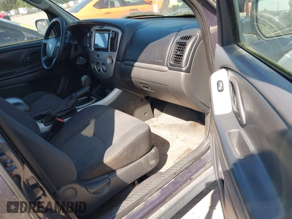 2006 Mazda Tribute i with VIN 4F2YZ02Z16KM00215, listed as a IAAI auction lot 42153919 with 272,828 mi miles and . Bid and sale history available at carsss.com. Image 5.