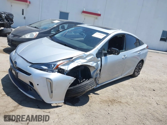 2022 Toyota Prius L Eco with VIN JTDKAMFU5N3188107, listed as a IAAI auction lot 42223649 with 180,894 mi miles and . Bid and sale history available at DreamBid. Image 18.