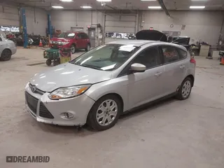 2012 Ford Focus SE with VIN 1FAHP3K26CL432308, listed as a IAAI auction lot 41854113 with 153,094 mi miles. Bid and sale history available at carsss.com. Image 2.