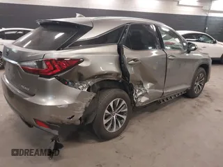 2021 Lexus RX with VIN 2T2HZMDA7MC292353, listed as a IAAI auction lot 41320034 with 29,571 mi miles. Bid and sale history available at carsss.com. Image 4.