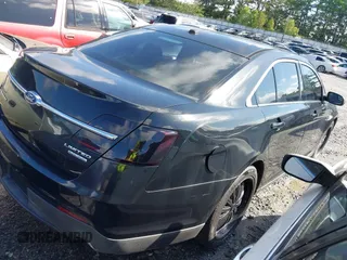 2013 Ford Taurus Limited z VIN 1FAHP2F81DG103292, wystawiony jako IAAI lot #42219104 z przebiegiem 86 085 mil mil oraz . Historia ofert i sprzedaży dostępna na DreamBid. Obrazek 4.