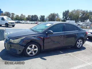 2014 Chevrolet Cruze 1LT z VIN 1G1PC5SB5E7154437, wystawiony jako IAAI lot #42215520 z przebiegiem 152 834 mil mil oraz . Historia ofert i sprzedaży dostępna na DreamBid. Obrazek 15.