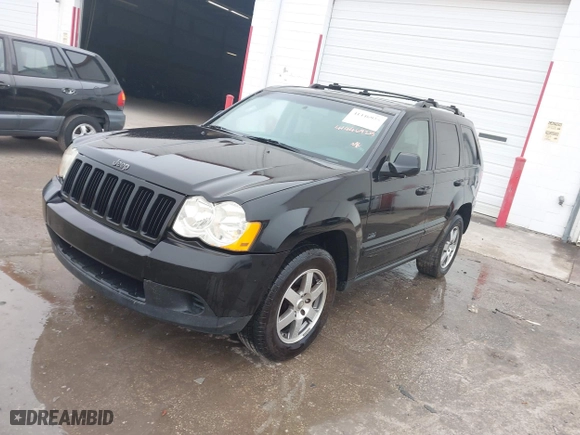 2009 Jeep Grand Cherokee Laredo with VIN 1J8GS48K39C549136, listed as a IAAI auction lot 41446925 with 162,639 mi miles. Bid and sale history available at carsss.com. Image 2.