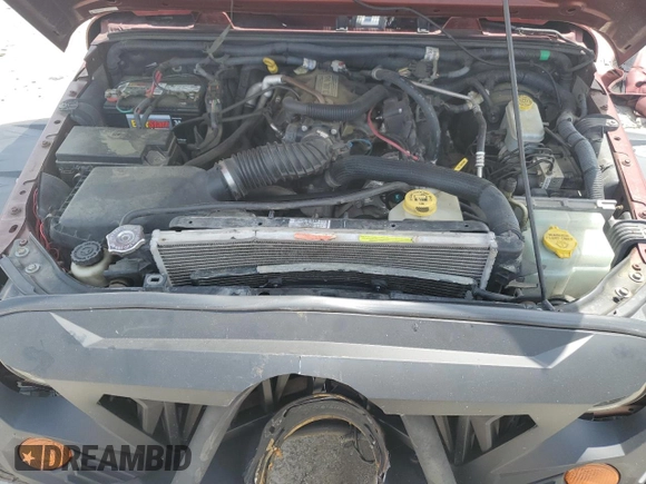 2007 Jeep Wrangler Unlimited X with VIN 1J4GA39187L161451, listed as a Copart auction lot 55280905 with 214,660 mi miles and Salvage Title. Bid and sale history available at DreamBid. Image 12.