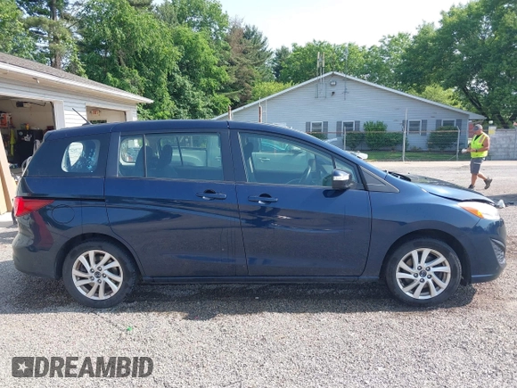 2015 Mazda 5 Sport z VIN JM1CW2BL9F0187973, wystawiony jako IAAI lot #42378711 z przebiegiem 97 543 mil mil oraz . Historia ofert i sprzedaży dostępna na DreamBid. Obrazek 13.