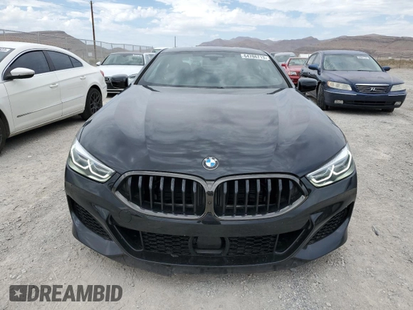 2022 BMW 8 Series M850i xDrive z VIN WBABC4C04NCJ45659, wystawiony jako Copart lot #64786713 z przebiegiem 18 091 mil mil oraz . Historia ofert i sprzedaży dostępna na DreamBid. Obrazek 5.