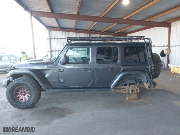 2018 Jeep Wrangler Unlimited Rubicon with VIN 1C4HJXFN1JW185914, listed as a IAAI auction lot 41360730 with 152,777 mi miles. Bid and sale history available at carsss.com. Image 14.