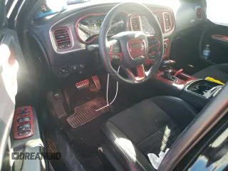 2018 Dodge Charger Daytona with VIN 2C3CDXCT4JH283018, listed as a Copart auction lot 48707905 with 121,624 mi miles and Salvage title. Bid and sale history available at DreamBid. Image 8.