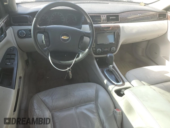 2013 Chevrolet Impala LTZ with VIN 2G1WC5E35D1173047, listed as a Copart auction lot 54965245 with 135,115 mi miles and Salvage Title. Bid and sale history available at DreamBid. Image 8.