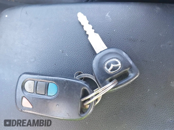 2009 Mazda 3 S Touring with VIN JM1BK344491232299, listed as a IAAI auction lot 42147921 with 163,671 mi miles and . Bid and sale history available at DreamBid. Image 11.