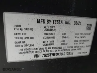 2024 Tesla Cybertruck with VIN 7G2CEHEDXRA017616, listed as a IAAI auction lot 41916341 with 7,373 mi miles. Bid and sale history available at carsss.com. Image 9.