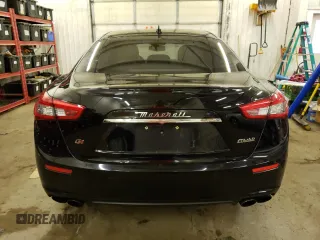 2016 Maserati Ghibli S Q4 with VIN ZAM57RTA3G1171304, listed as a Copart auction lot 69976983 with 97,099 mi miles. Bid and sale history available at carsss.com. Image 6.