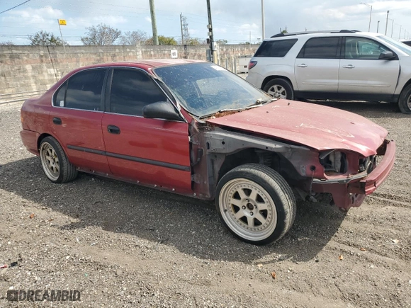 1997 Honda Civic LX "O" w/Air with VIN 1HGEJ6674VL030992, listed as a Copart auction lot 49231255 with 123,617 mi miles and Salvage Title. Bid and sale history available at carsss.com. Image 4.