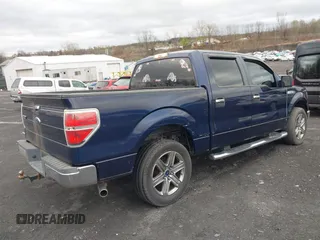 2009 Ford F-150 XL with VIN 1FTPW12V59FA18709, listed as a IAAI auction lot 42053057 with 156,035 mi miles. Bid and sale history available at carsss.com. Image 4.