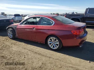 2012 BMW 3 Series 328i with VIN WBAKE5C51CE756536, listed as a Copart auction lot 86876884 with 69,010 mi miles and Salvage Title. Bid and sale history available at carsss.com. Image 2.