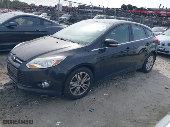 2012 Ford Focus SEL with VIN 1FAHP3M2XCL363037, listed as a IAAI auction lot 41816361 with 101,693 mi miles. Bid and sale history available at carsss.com. Image 17.