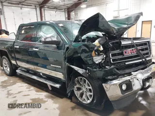 2014 GMC Sierra 1500 SLT with VIN 3GTU2VEC0EG486100, listed as a IAAI auction lot 42424069 with Not provided miles and . Bid and sale history available at DreamBid. Image 1.