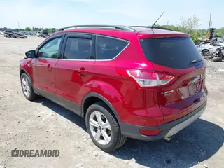 2016 Ford Escape SE z VIN 1FMCU9GX1GUC04815, wystawiony jako IAAI lot #42235499 z przebiegiem 84 713 mil mil oraz . Historia ofert i sprzedaży dostępna na DreamBid. Obrazek 3.