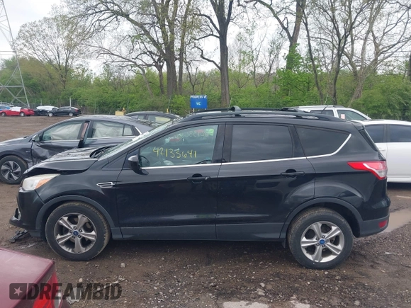 2013 Ford Escape SE with VIN 1FMCU0GX6DUC98598, listed as a IAAI auction lot 42133641 with 174,111 mi miles and . Bid and sale history available at DreamBid. Image 14.