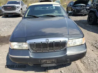 1999 Mercury Grand Marquis LS with VIN 2MEFM75W0XX731008, listed as a Copart auction lot 54375795 with 88,080 mi miles and Salvage Title. Bid and sale history available at DreamBid. Image 5.