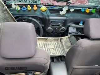 2014 Jeep Wrangler Sport with VIN 1C4AJWAG4EL205584, listed as a Copart auction lot 63671245 with Not provided miles and Salvage title. Bid and sale history available at DreamBid. Image 8.