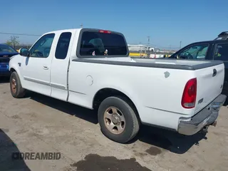 2003 Ford F-150 with VIN 1FTRX17W83KB15716, listed as a IAAI auction lot 42136249 with 169,560 mi miles and . Bid and sale history available at DreamBid. Image 3.