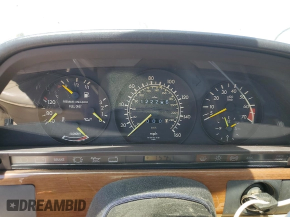 1990 Mercedes-Benz 300 with VIN WDBCA24D1LA529716, listed as a Copart auction lot 56581335 with 122,286 mi miles and Salvage Title. Bid and sale history available at DreamBid. Image 9.