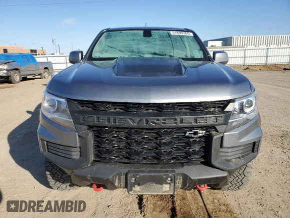 2021 Chevrolet Colorado 4WD ZR2 with VIN 1GCGTEEN6M1221254, listed as a Copart auction lot 51690365 with 49,063 mi miles and Salvage title. Bid and sale history available at DreamBid. Image 5.