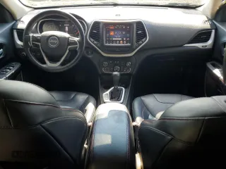 2015 Jeep Cherokee Trailhawk с VIN 1C4PJMBS3FW698997, выставлен на аукционе Copart как лот 63470875 с пробегом 107 535 миль миль и Списание • Salvage title. История ставок и продаж доступна на DreamBid. Изображение 8.