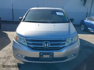 2011 Honda Odyssey Touring with VIN 5FNRL5H9XBB012899, listed as a IAAI auction lot 41611879 with 171,041 mi miles. Bid and sale history available at carsss.com. Image 12.