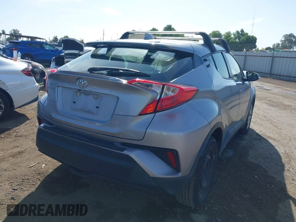 2019 Toyota C-HR XLE with VIN JTNKHMBX9K1044591, listed as a IAAI auction lot 42012934 with 139,858 mi miles and . Bid and sale history available at DreamBid. Image 4.