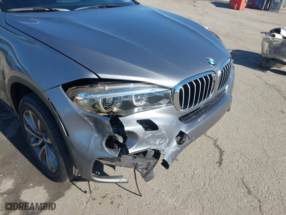2015 BMW X6 xDrive50i with VIN 5UXKU6C52F0F94060, listed as a IAAI auction lot 41299202 with 67,835 mi miles. Bid and sale history available at carsss.com. Image 6.