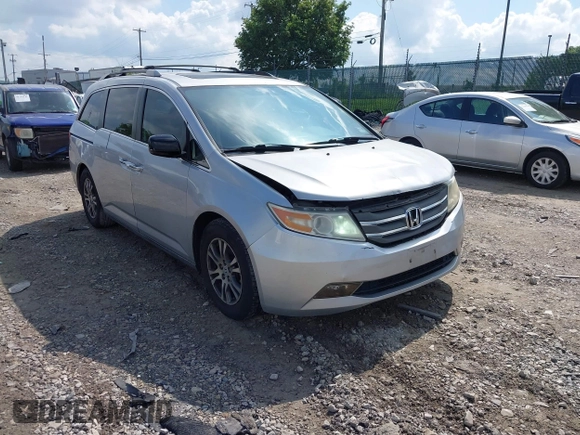 2012 Honda Odyssey EX-L with VIN 5FNRL5H61CB081634, listed as a IAAI auction lot 42760909 with 197,949 mi miles and . Bid and sale history available at DreamBid. Image 1.