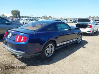 2011 Ford Mustang V6 with VIN 1ZVBP8AM1B5128934, listed as a IAAI auction lot 41805865 with 165,178 mi miles and . Bid and sale history available at carsss.com. Image 4.