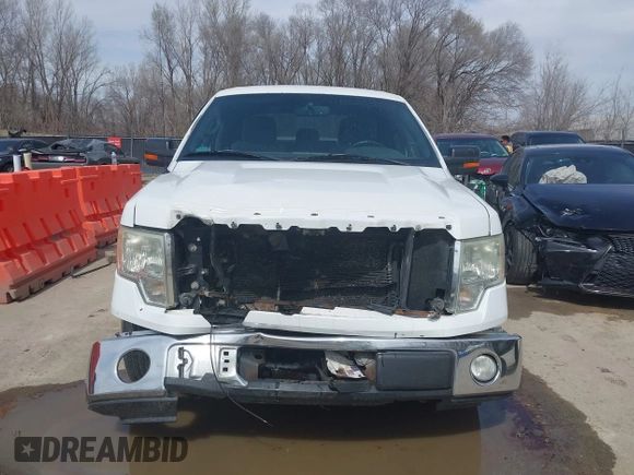 2012 Ford F-150 XL z VIN 1FTFW1CF0CFA13430, wystawiony jako IAAI lot #41811812 z przebiegiem 283 228 mil mil oraz . Historia ofert i sprzedaży dostępna na DreamBid. Obrazek 13.