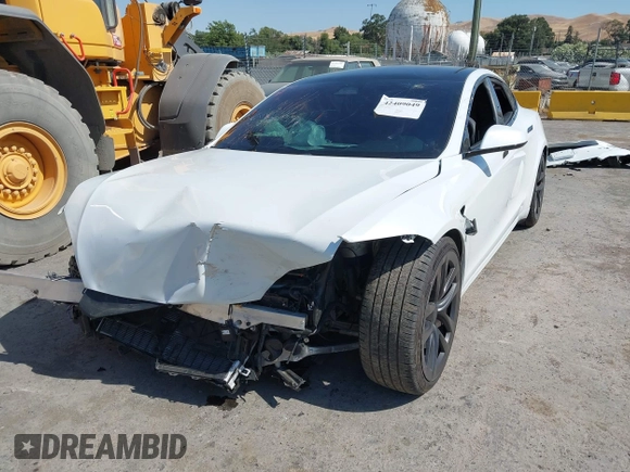 2023 Tesla Model S with VIN 5YJSA1E59PF500816, listed as a IAAI auction lot 42409049 with Not provided miles and . Bid and sale history available at DreamBid. Image 6.