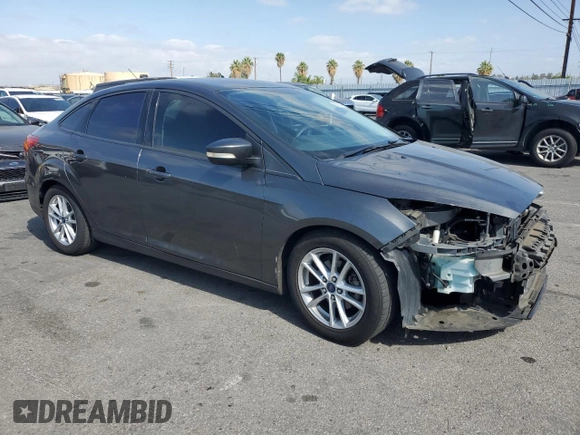 2017 Ford Focus SE with VIN 1FADP3F25HL300155, listed as a Copart auction lot 61685025 with 93,317 mi miles and Salvage title. Bid and sale history available at DreamBid. Image 4.