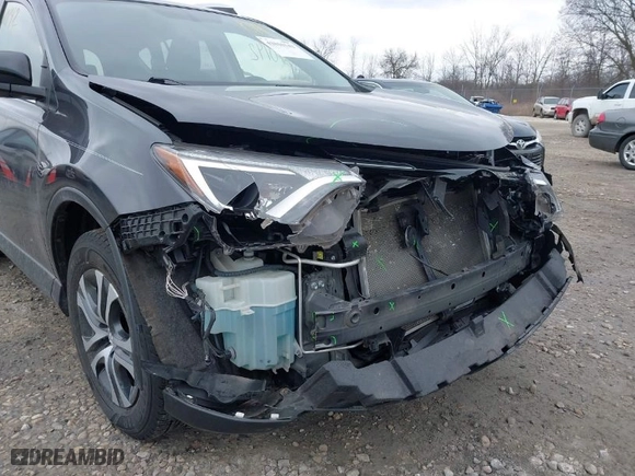 2016 Toyota RAV4 LE with VIN JTMBFREVXGJ091427, listed as a IAAI auction lot 42010142 with 165,548 mi miles. Bid and sale history available at carsss.com. Image 17.