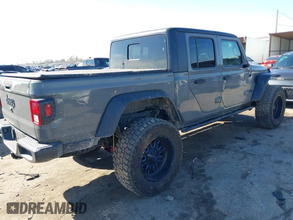 2020 Jeep Gladiator Sport S with VIN 1C6JJTAG6LL190749, listed as a IAAI auction lot 41401209 with 97,292 mi miles and . Bid and sale history available at DreamBid. Image 4.
