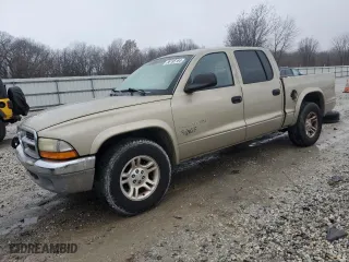 2002 Dodge Dakota SLT with VIN 1B7HL48N32S586363, listed as a Copart auction lot 86195184 with 144,064 mi miles and Salvage Title. Bid and sale history available at carsss.com. Image 1.