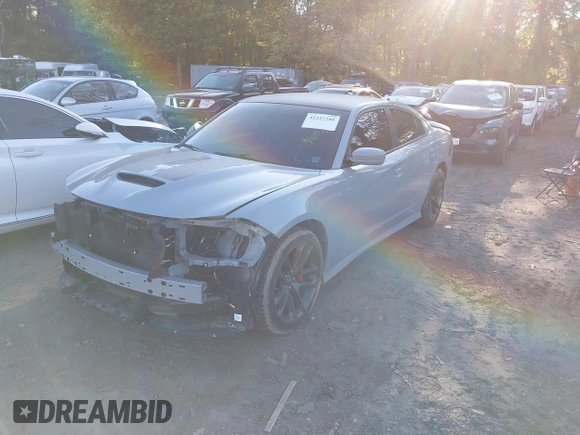 2021 Dodge Charger R/T with VIN 2C3CDXCT8MH594715, listed as a IAAI auction lot 42257288 with 11,570 mi miles and . Bid and sale history available at DreamBid. Image 18.