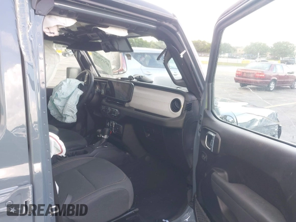 2024 Jeep Wrangler Sport S with VIN 1C4PJXDN8RW370133, listed as a IAAI auction lot 42453029 with 10,415 mi miles and . Bid and sale history available at DreamBid. Image 5.