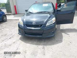 2009 Toyota Matrix S z VIN 2T1KE40E59C013004, wystawiony jako IAAI lot #42113274 z przebiegiem 228 031 mil mil oraz . Historia ofert i sprzedaży dostępna na DreamBid. Obrazek 6.