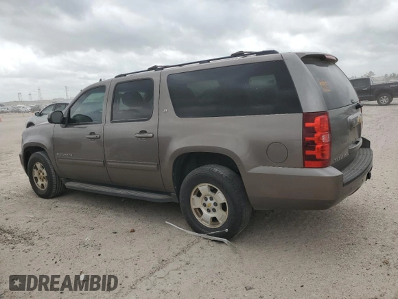 2011 Chevrolet Suburban LT with VIN 1GNSCJE00BR396287, listed as a Copart auction lot 51642665 with 219,648 mi miles and Salvage Title. Bid and sale history available at carsss.com. Image 2.